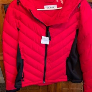 Womens Calvin Klein jacket with hood red and black side stretch w/zip pockets